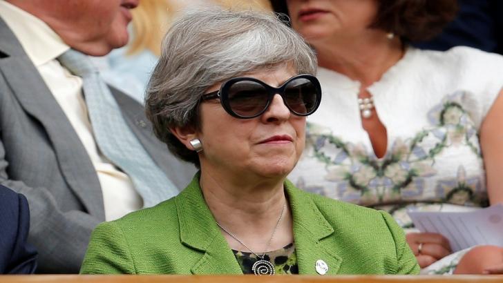Theresa May hiding behind her sunglasses